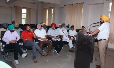 Scientists discuss with farmers about cultivation of vegetables and pulses