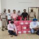 20 packs of Johnnie Walker Red Label whiskey stolen from 2 cars by Excise Department, two arrested