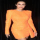 Malaika's glamorous look in the launch event, beauty in orange dress