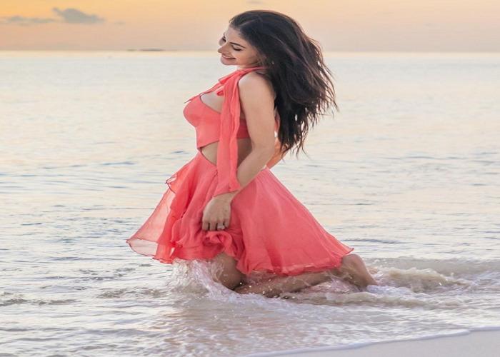 Mouni Roy was seen in a red dress on the beach, posing in a cool style