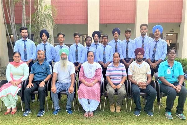 The players of Nankana Sahib School won the first place in basketball