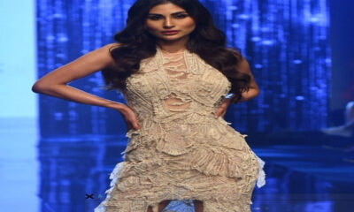 Mouni walked the ramp in a net dress, full of beauty