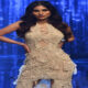 Mouni walked the ramp in a net dress, full of beauty