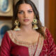 Hussain's queen Himanshi Khurana flaunts her beauty with jhumkas and mehrun suits.