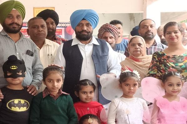 MLA Bhola Grewal magazine release in government school on the occasion of Children's Day