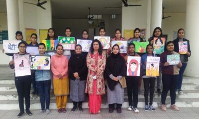 Poster making competition organized on social problems at Arya College