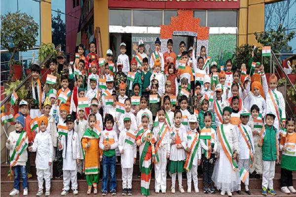 Springdale School painted in the colors of the tricolor