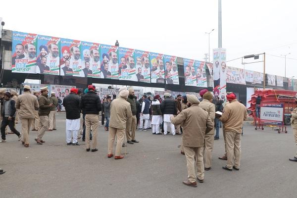 Rahul Gandhi covered with bulletproof shield due to security