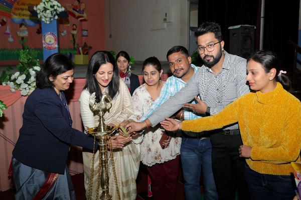 Conducting orientation session for parents of newly admitted nursery students