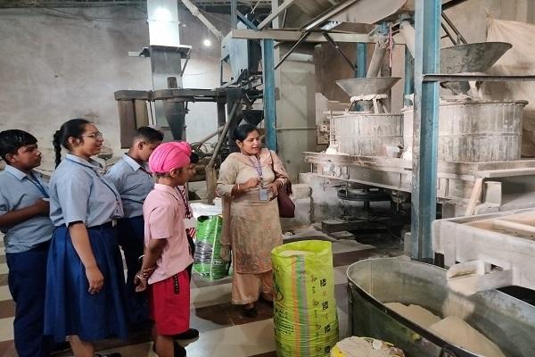 A visit to the flour mill by the children of the inclusive wing of 'Drishti' school