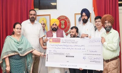 Chairman Suresh Goyal presented a check of 14 lakhs for the Chief Minister's Relief Fund