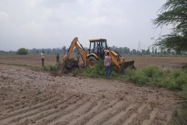 Galada made hundreds of acres of land in Koom Kalan free from occupation